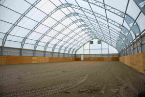 GB Series Fabric Structure on Wood Posts for an Equestrian Indoor Riding Area