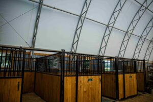 CC Series Fabric Structure on Wood Posts for Equine Interior Booths